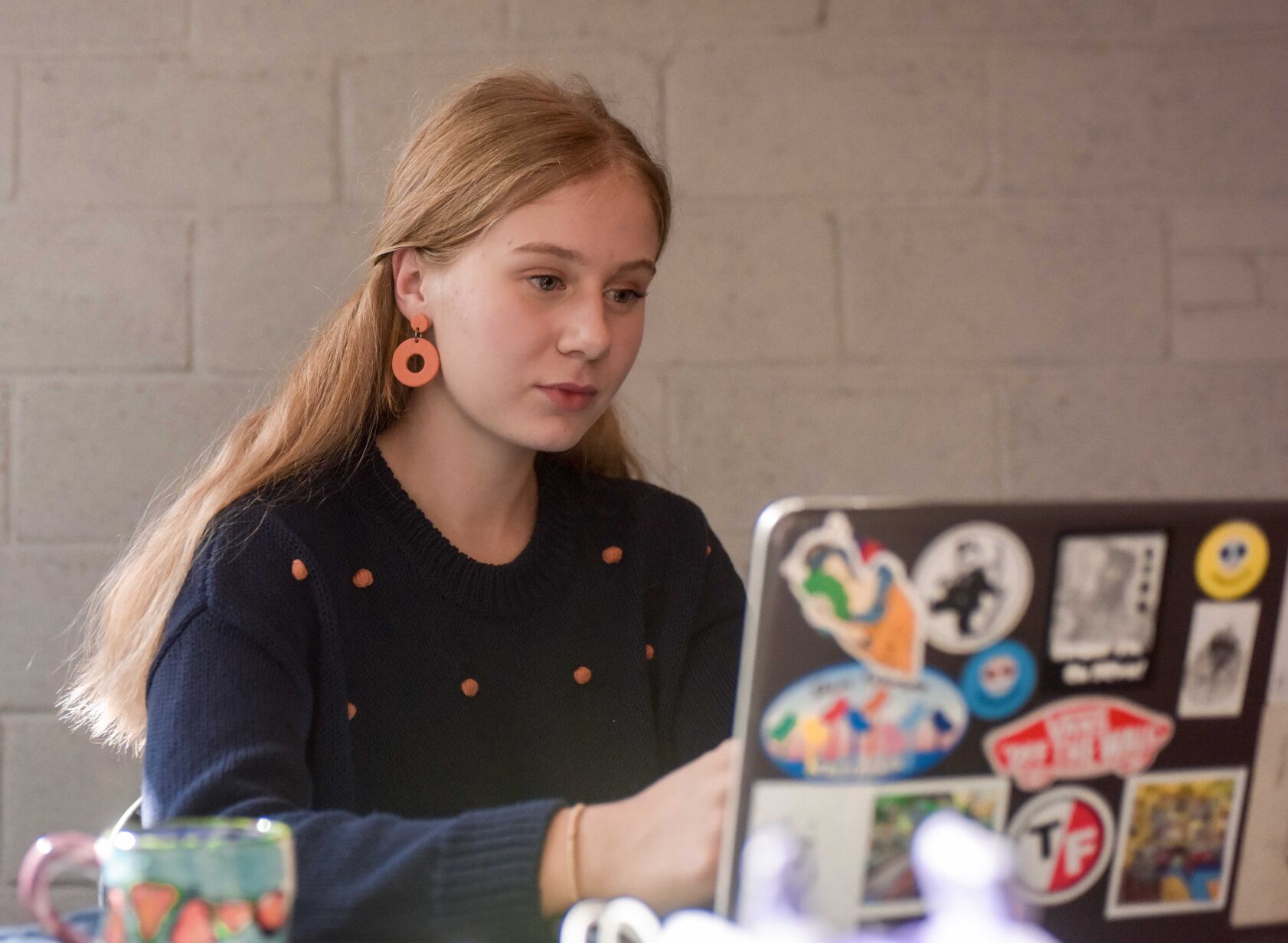 Avery Dixon attends her online environmental science class